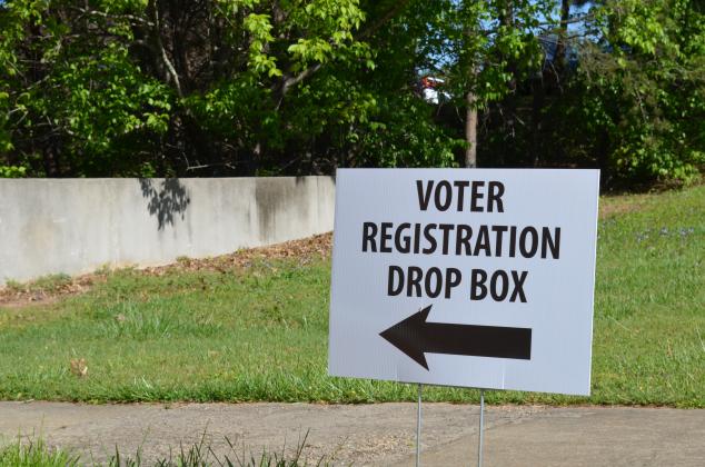 A sign in front of the office tells voters where the box is located. (Photo/Stephanie Hill)