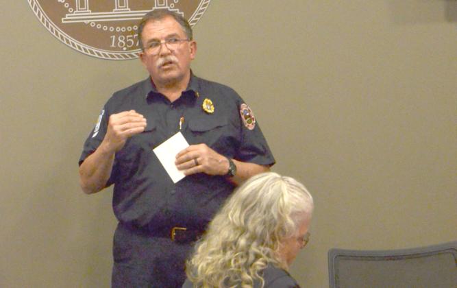 Retiring fire chief Norman Alexander speaks about his time with the county. (Photos/Wayne Hardy)