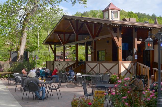 Diners gather at patio seating at the Cowboys &amp; Angels Restaurant in Helen on Tuesday evening. (Photo/Wayne Hardy)
