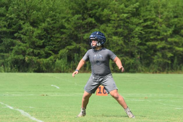 Dylan Archer, left, and the Warriors wrap up acclimation workouts this week and will put on the pads for the first time on Aug. 3. (Photo/Mark Turner)