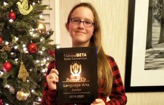 Allyssa Harkins with her state award. (Submitted photo)