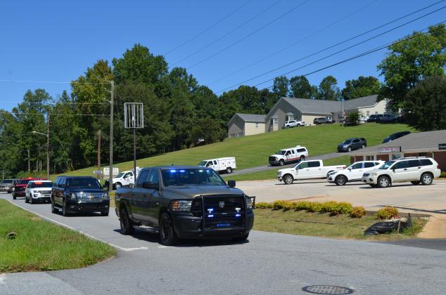 Local public safety vehicles joined the funeral procession Sept. 21 for White County Animal Control division chief Joey Kastner. (Photo/Stephanie Hill)
