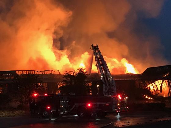 Firefighters battle flames at White County Mouldings early morning on Oct. 22. (Photo courtesy/Carl Dann)