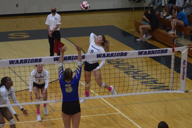 WCHS senior Jenna Ash, the Region 7-AAA Player of the Year, hammers a shot during the win over Ringgold Tuesday in the first round of the Class AAA state tournament. (Photo/Mark Turner)