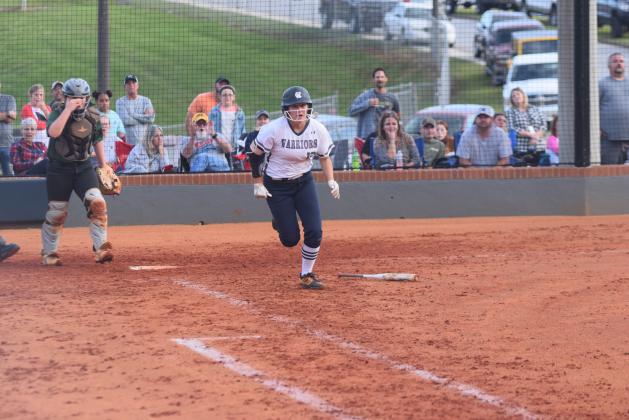 Lianna O'Kelly pitched both games for the Lady Warriors during the opening round of the Class AAA state playoffs Tuesday in Sonoraville.  (Photo/Mark Turner)