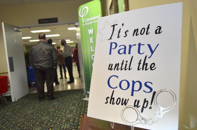 A humorous sign greeted guests – including law enforcement – at the event.