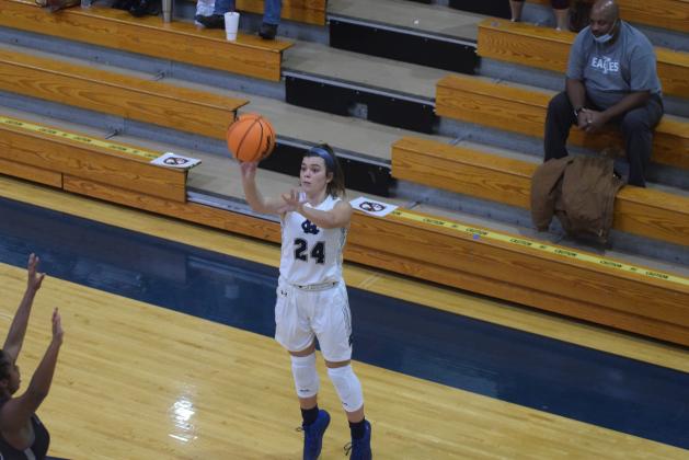 Makenna Moose and the Lady Warriors take on North Hall Saturday afternoon in a 7-AAA game in Cleveland. (Photo/Mark Turner)