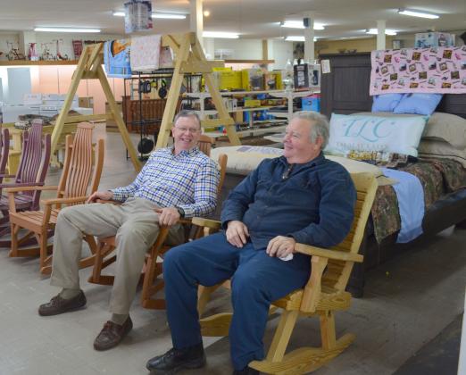 Charlie Thomas and Larry Kinsey chatted one morning while in the rocking chairs at the store.