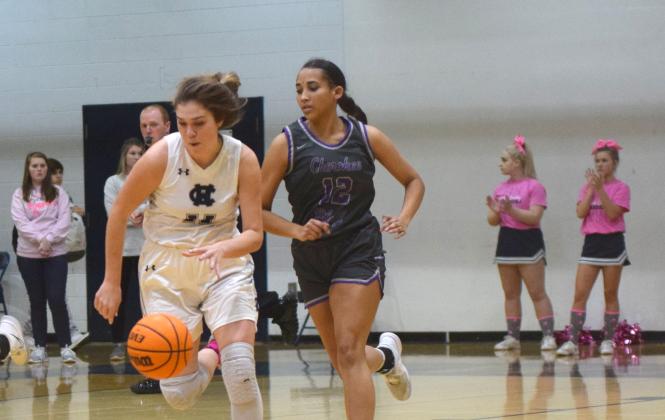 Maddie Futch pushes the ball up the court during the first quarter of the Lady Warriors' region win over Cherokee Bluff. (Photo/Mark Turner)