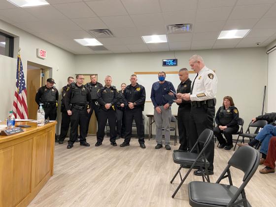 In front from left, Sgt. Brandon Landress, Cpl. Brandon Wood, Officer Denton Vaughan and Fire Chief Ricky Pruitt were presented with  letters of commendation (Pruitt was accepting on behalf of Payton Cagle) from CPD Maj. Aaron Weiland and Police Chief Jeff Shoemaker. (Photo/Stephanie Hill)