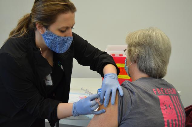 Laurie Politano, RN, gave Denyse Brennan her second dose of the coronavirus vaccine at the MedLink Georgia vaccination clinic held Feb. 25 at Resurrection Episcopal Church. (Photo/Stephanie Hill)