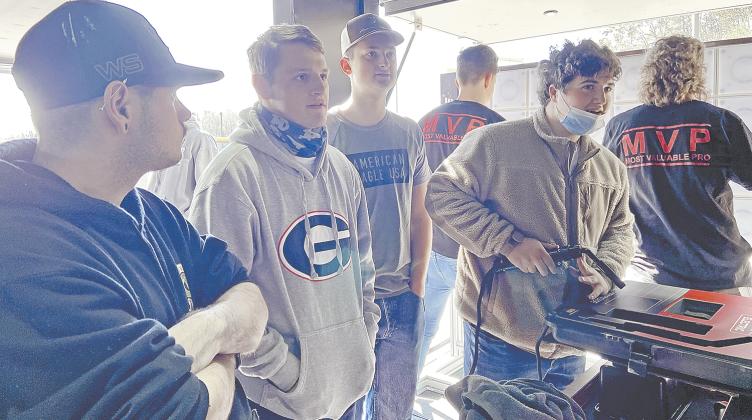 Luke Bass talks at a welding simulation during the Be Pro Be Proud event Jan. 26 at White County High School. (Photo/Stephanie Hill)