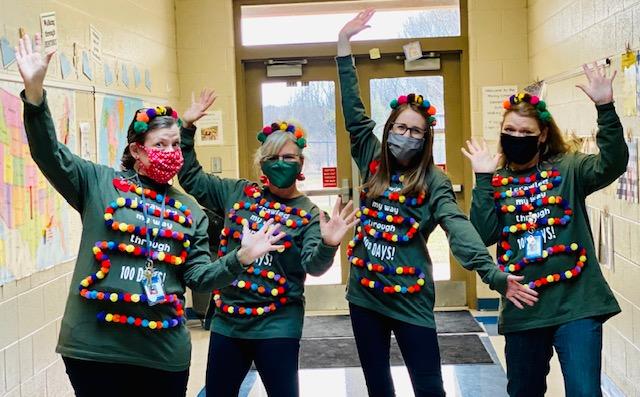 Fifth grade teachers enjoyed wearing their “I crawled my way through 100 days of school “ caterpillar shirts. From left are Millie Edwards, Shanda Bartlett, Julie Martin (student teacher), and Susan Sargent.