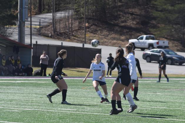McKinley Jones, right, and the White County High School soccer team opened the 2021 season Wednesday with a non-region doubleheader against Jefferson. (Photo/Mark Turner)