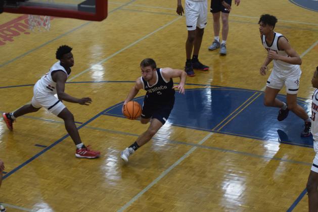 Reece Dockery drives to the basket during the Sweet 16 game last Friday.