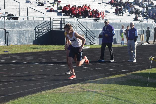 Eamonn O'Bryant won a pair of individual events to lead the track teams to the boy's and girl's team titles at the Warrior Invitational last Friday in Cleveland.