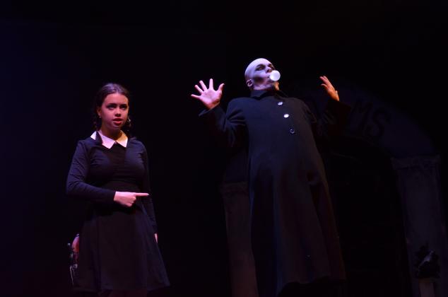 Molly Cutchshaw as Wednesday Addams, and Colin Baughman as Fester, got into character during dress rehearsals on Monday, April 19.