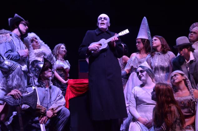 Colin Baughman, as Fester, sings a song with the ancestors during the show.
