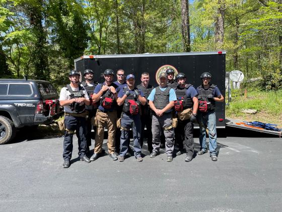 Pictured from left:  Firefighter Austin Brown, firefighter Jason Ravan, firefighter Shad Sosebee, Capt. Robbie Burke and Capt. Josh Taylor, of White County Fire Services, officer Wesley Addis and officer Brandon Wood of the Cleveland Police Department, and Battalion Chief Terry Sosebee, firefighter Bradley Martin and firefighter Casey Creel of White County Fire Services. (Photos courtesy White County Public Safety)