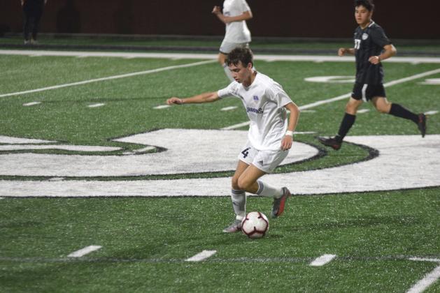 Thad Gensler had a pair of goals in the 6-3 non-region loss Tuesday to West Forsyth. (Photo/Mark Turner)