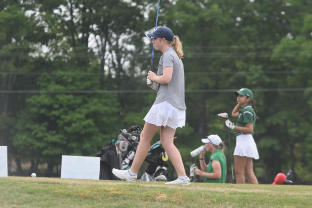 Catie Craig finished second in the state golf tournament as the Lady Warriors captured the school's first team state championship in the sport.