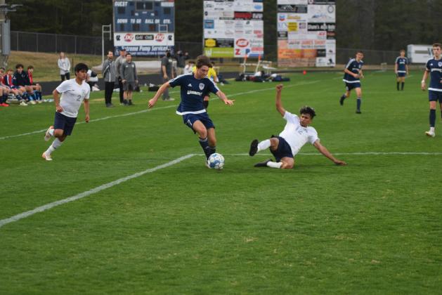 WCHS senior striker Hayden Gensler, right, is the Region 7-AAA Boy's Player of the Year. (Photos/Mark Turner)