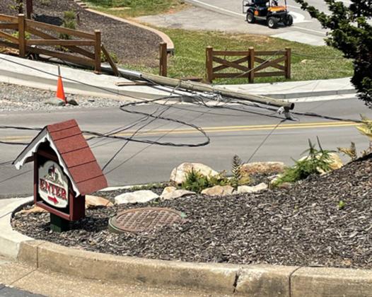 The downed pole and power lines. (Submitted photo)