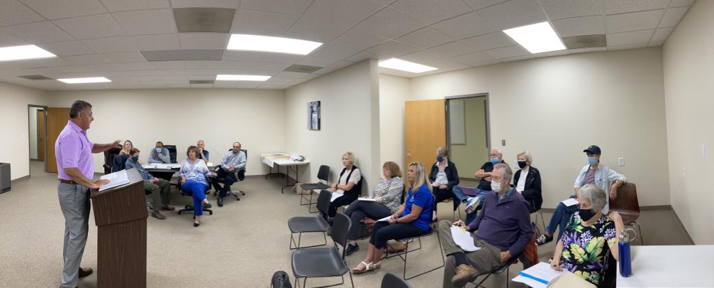 State Sen. Steve Gooch (left) addresses an audience of residents and elections officials May 3. (Photo/Wayne Hardy
