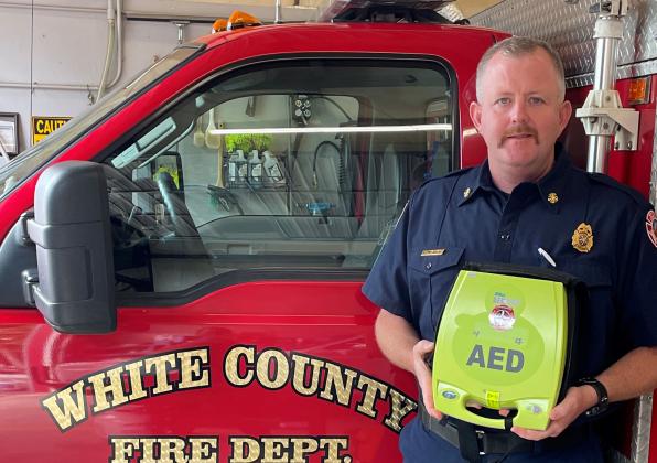 White County Fire Chief Seth Weaver with the AED. (Submitted photos)
