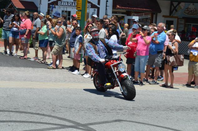 Even with sunny skies, Saturday in Helen was brightened by the annual Shriners parade through downtown. The June 12 procession through downtown featured a crowd-pleasing showcase of motor vehicles, costumes and good-natured antics. (Photos/Stephanie Hill)