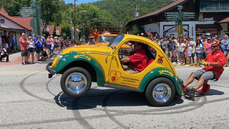 Even with sunny skies, Saturday in Helen was brightened by the annual Shriners parade through downtown. The June 12 procession through downtown featured a crowd-pleasing showcase of motor vehicles, costumes and good-natured antics. (Photos/Stephanie Hill)