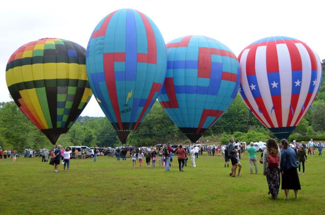 Conditions prevented the race from starting during Thursday morning's kickoff event on June 3, however, the crowd got to see the hot air balloons on display and chat with pilots. (Photo/Wayne Hardy)