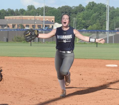 Gabby Whiddon celebrates during the Lady Warriors' summer league win Tuesday over Union County. (Photo/Mark Turner)