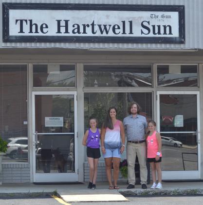Pictured are Anna Welch, Dan Hunt, and daughters Jessie (left), 11 and Jodi (right), 9.