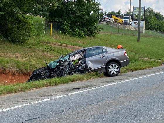 A 2009 Honda Civic driven by Jordan Alexander, 21, of Cleveland, was damaged after hitting a 2017 Freightliner tractor-trailer. (Photo/Stephanie Hill)