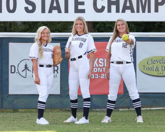 WCHS seniors, from left, Annika Vandiver, Reagan Dunagan, and Liana O'Kelly have some fun during a photo session. The senior trio will lead the softball squad this fall as they chase a Region 7-AAA title and a spot in the Class AAA state playoffs. (Photo/Staci Sulhoff)