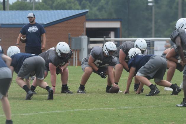 WCHS center Trenton O'Kelly, above, and the Warriors head to East Forsyth Friday for a preseason scrimmage with the Broncos. (Photo/Mark Turner)