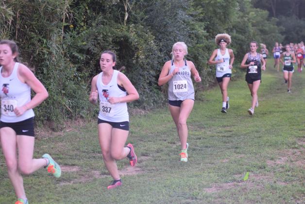 Nealeigh Broadwell was one of the top runners for the Warrior cross country teams during the Warpath Invitational in Canton.