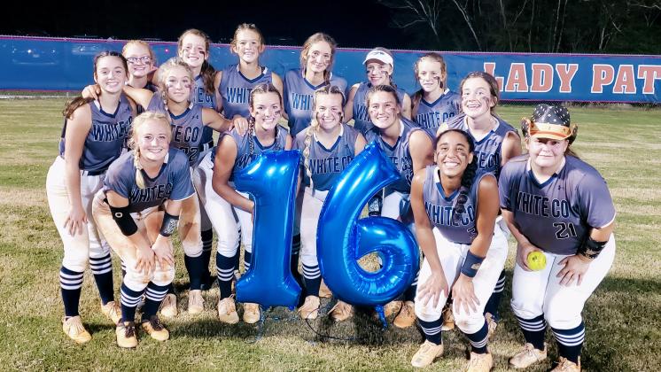 The Lady Warriors celebrate after sweeping the first round series at Sandy Creek last week. WCHS opened the Sweet 16 three-game series with SE Bulloch Wednesday in Brooklet, looking to advance to the Elite 8 for the first time since 2010, when the Lady Warriors won the state championship. (Photo/Mark Turner)