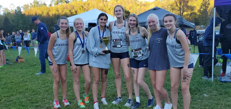 The Lady Warriors are headed back to the state meet after finishing second in the Region 7-AAA meet last week at Unicoi State Park. The runners will compete in the Class AAA race Friday at 11:15 a.m. in Carrollton. Members of the team are, front left, Emma Lightsey, Nealeigh Broadwell, Lily Gearing, Brianna Bilhovde, Lydia Davidson, Reese Vandegriff, and Emma Marrow. (Photo/Mark Turner)