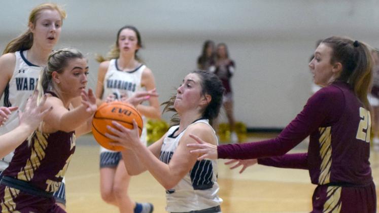 Chesnee Freeman works her way through the Dawson County defense during the 7-AAA opener Tuesday night. (Photo/Mark Turner)