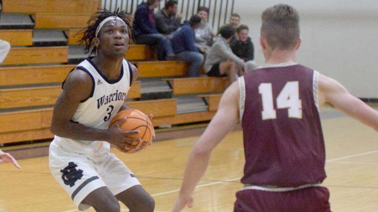 Silas Mulligan had a game-high 24 points in the Warriors' win over Dawson County Tuesday in Cleveland. (Photo/Mark Turner)