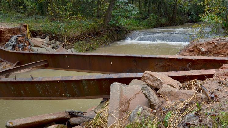 Shown are the bridge remnants on Airport Road on Oct. 12, 2020, not long after being washed out.