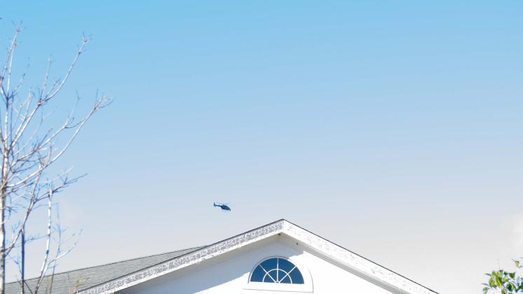 Helicopter searching over Baby Land General.