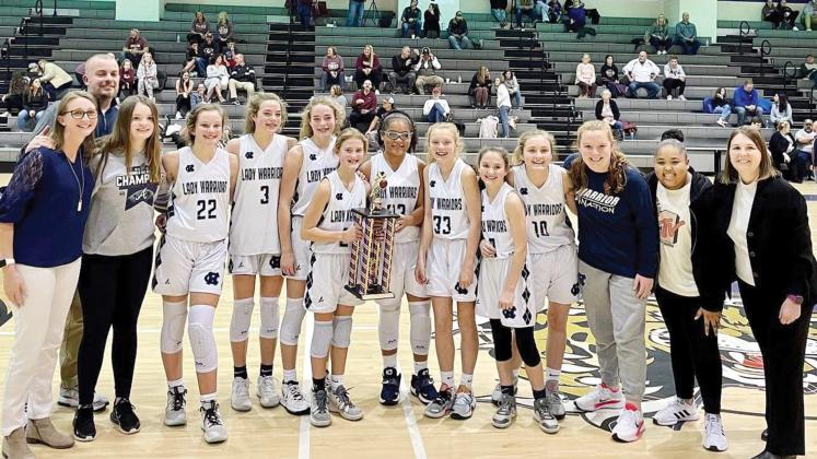The White County Middle School seventh-grade teams shows off some championship hardware after winning the North Georgia Mountain League title last week in Ellijay. (Photo/WCMS Athletics)