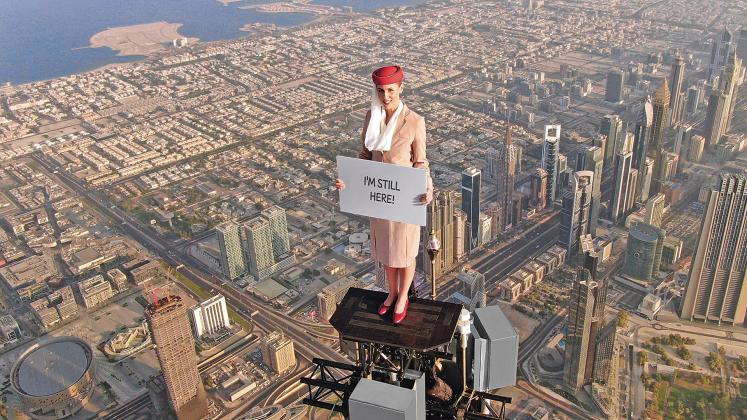 Nicole Smith-Ludvik is shown standing on a platform atop the Burj Khalifa – the world’s tallest building – in Dubai. The former White County resident has gained global attention for the stunt, which was part of an ad campaign for Emirates airlines. (Photos courtesy Emirates)
