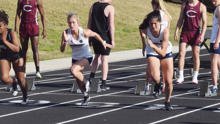 White County's Emma Hare, left, and Adelynn Knight take off at the start of the 100-meter race last week at Chestatee. Knight won the race, with Hare finishing second. (Photos/Mark Turner)