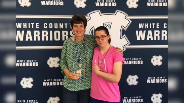 WCSS Nutrition Services Director Abby Rowland (left) and WCHS Senior Joey Cloer were recently recognized for their outstanding work in the Community Based Instruction program. Rowland received the Carter Cruce Business Partnership award and Cloer received the Carter Cruce Worksite Achievement Award. These honors are named after former student Carter Cruce whose work in the program inspired the award. (Submitted Photo)