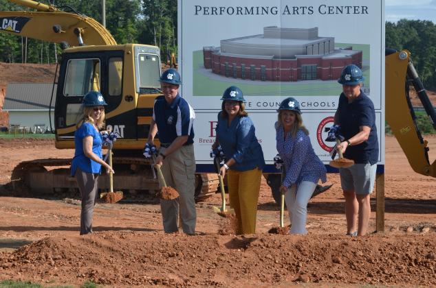 School board members broke ground Tuesday on a new 41,000 square-ft. performing arts center on the campus of White County High School. From left are Linda Erbele, vice-chairman Charlie Thomas, Superintendent Dr. Laurie Burkett, chairman Missy Jarrard and Jon Estes.