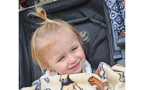 Wrapped in a blanket, 2-year-old Matilda Fay Webb was visiting Helen this week with her family from Lucedale, Miss. Her parents Jon and Savannah Webb were prepared for this week’s frigid weather. (Photo/Linda Erbele)
